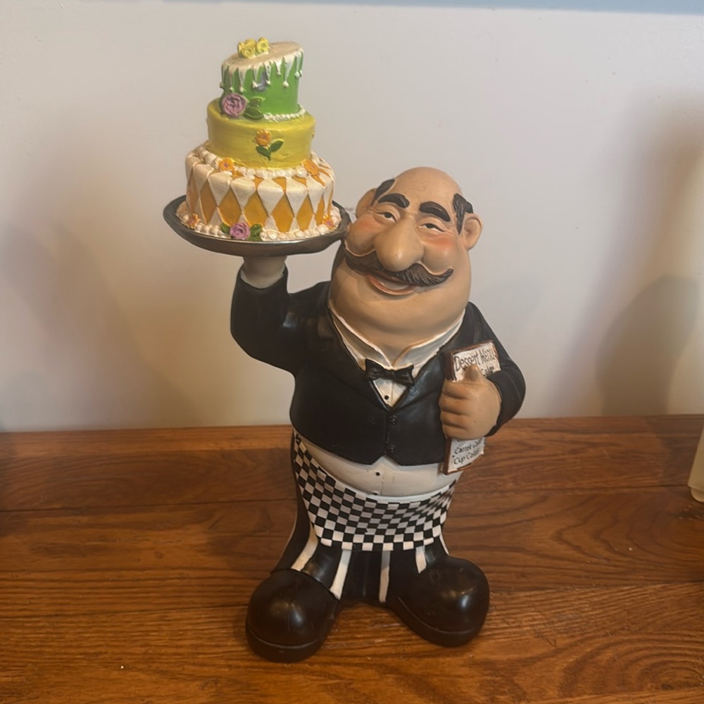 Adorable fat man statue